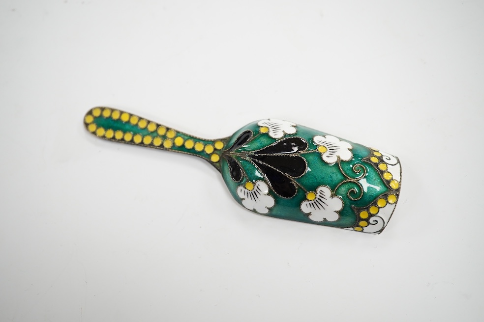 A Soviet Union 916 gilt white metal and enamel caddy spoon, 91mm and vodka tot, 44mm. Condition - good